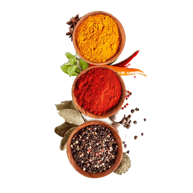  Three bowls filled with various spices and herbs displayed in a spice store in Sharjah, showcasing vibrant colors and textures.